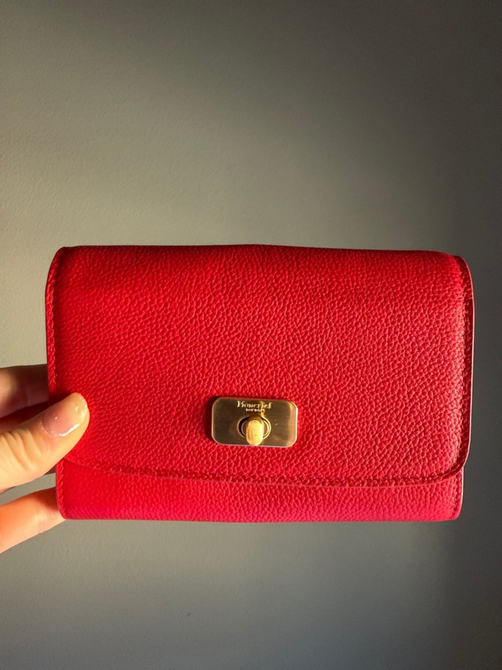 Red Pebble Leather Turn-Lock Wallet with Gold Hardware